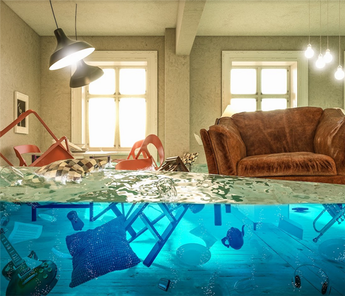 a flooded living room with furniture floating everywhere